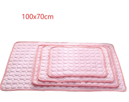 Pink pet cooling mat with raised bubble texture and stitched inner panel
