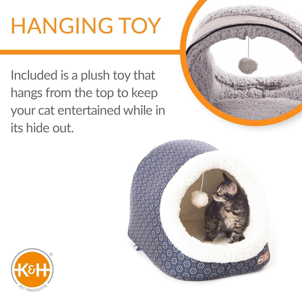 Jeffers heated cat bed featuring a plush hanging toy and a kitten inside a navy blue cave.