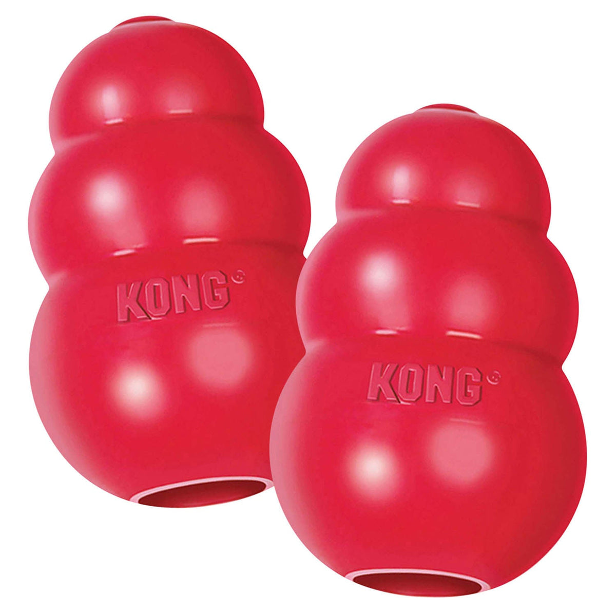 Two red KONG Classic rubber dog chew toys, glossy bumpy shapes side by side.