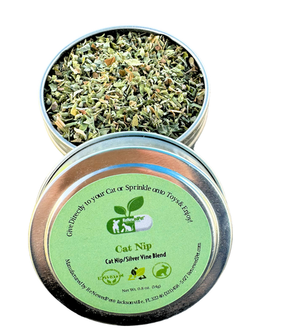 Catnip and silver vine mix metal tins with green labels and dried leaves