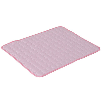Pink cooling pet mat with textured honeycomb surface and thin pink border