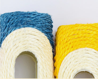 Blue and yellow sisal drum cat toy with beige rope tunnel openings