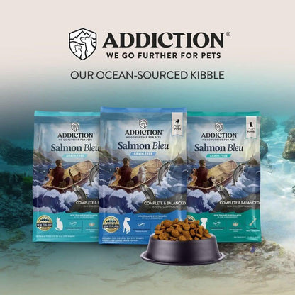 Salmon Bleu dry cat food ocean-sourced kibble with three bags and a kibble bowl