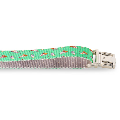 Close-up of green pizza-themed dog collar clasp with silver buckle