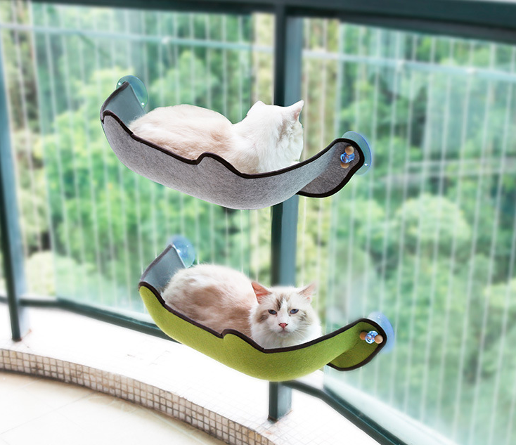 Pair of window cat hammocks: grey and green with dark trim and suction cups