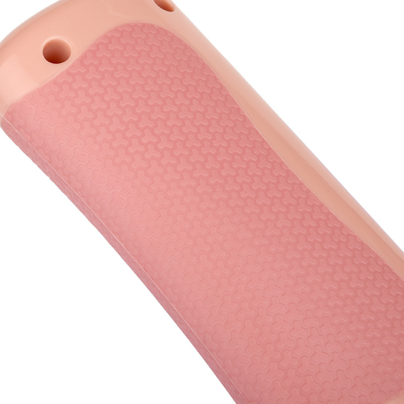 Pink pet grooming comb body with textured non-slip grip panel