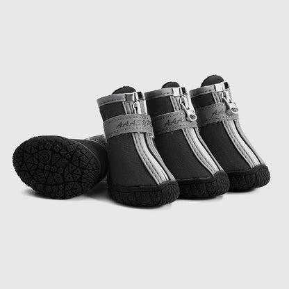 Waterproof pet rain boots in dark fabric with gray side panels and hook-and-loop straps.