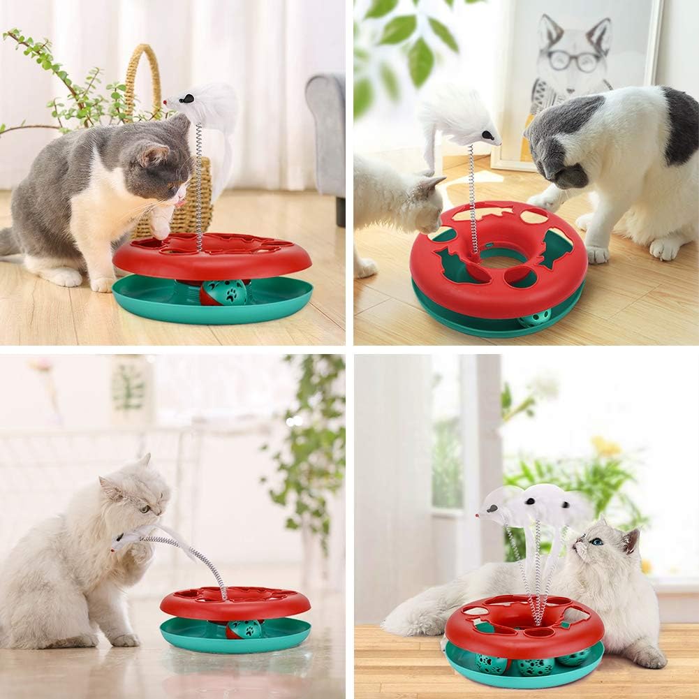Cats playing with a red-and-teal interactive cat toy with white spring mouse