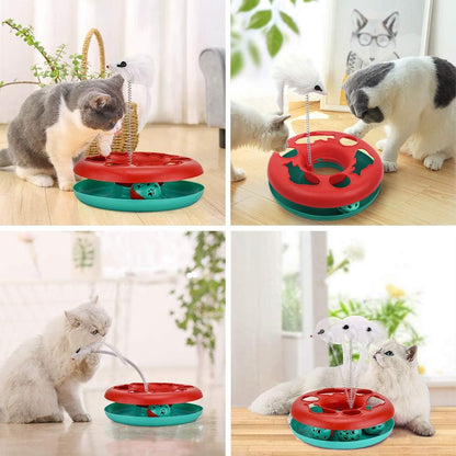 Cats playing with a red-and-teal interactive cat toy with white spring mouse