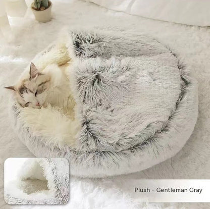 Gray plush pet bed with U-shaped hood and sleeping cat inside