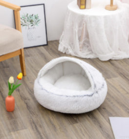 Cozy plush pet bed, oval design with white cushioned interior