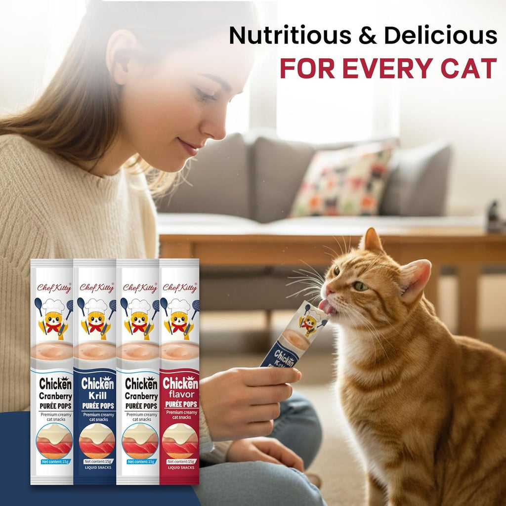 Orange tabby cat reaching for chicken puree tube cat treats next to tube pack