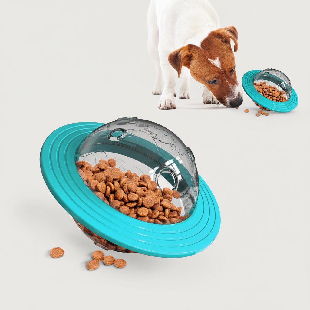 Teal interactive dog treat toy with clear dome holding treats and ridged edge