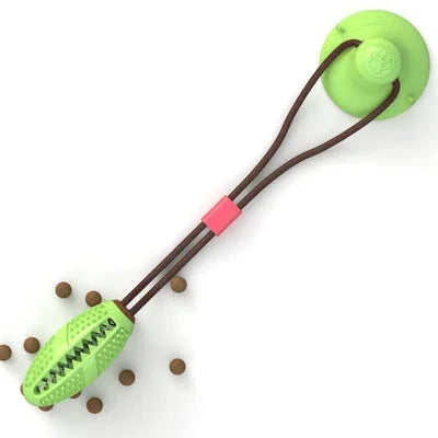 Green slow feeder lick mat with suction cup base and kibble, ideal for dog and cat mealtime enrichment