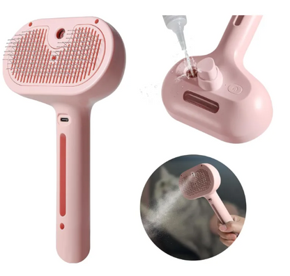 Pink pet hair spray brush with red bristle pad and built-in spray dispenser