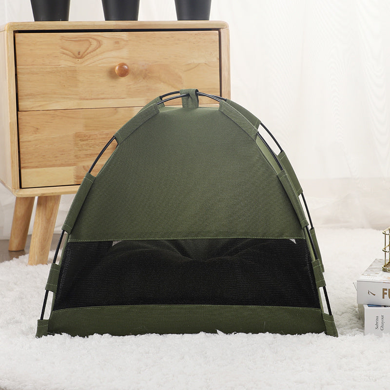 Green pet tent bed with arched frame and black mesh front