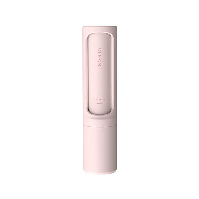 Pink lint roller brush device with textured roller head