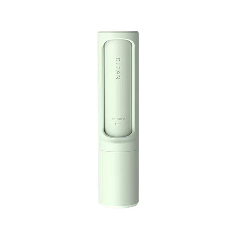 Mint green lint roller brush device with textured roller head