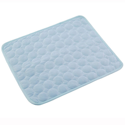 Light blue pet cooling pad with raised bubble-pattern top and rounded corners