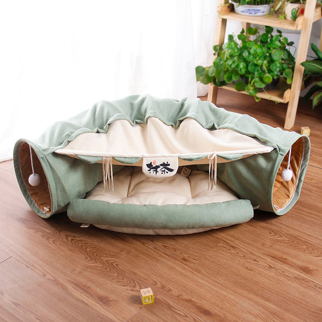 Collapsible cat tunnel play bed in light green with striped lining and round side openings