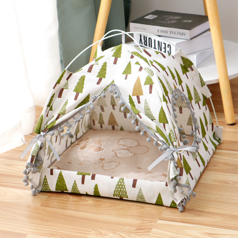 Enclosed cat tent pet bed, three-quarter view of cream tree-print fabric with mesh sides