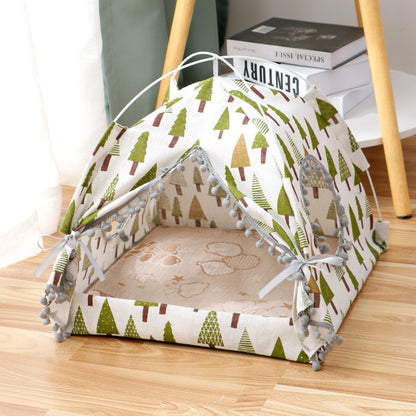 Enclosed cat tent pet bed, three-quarter view of cream tree-print fabric with mesh sides