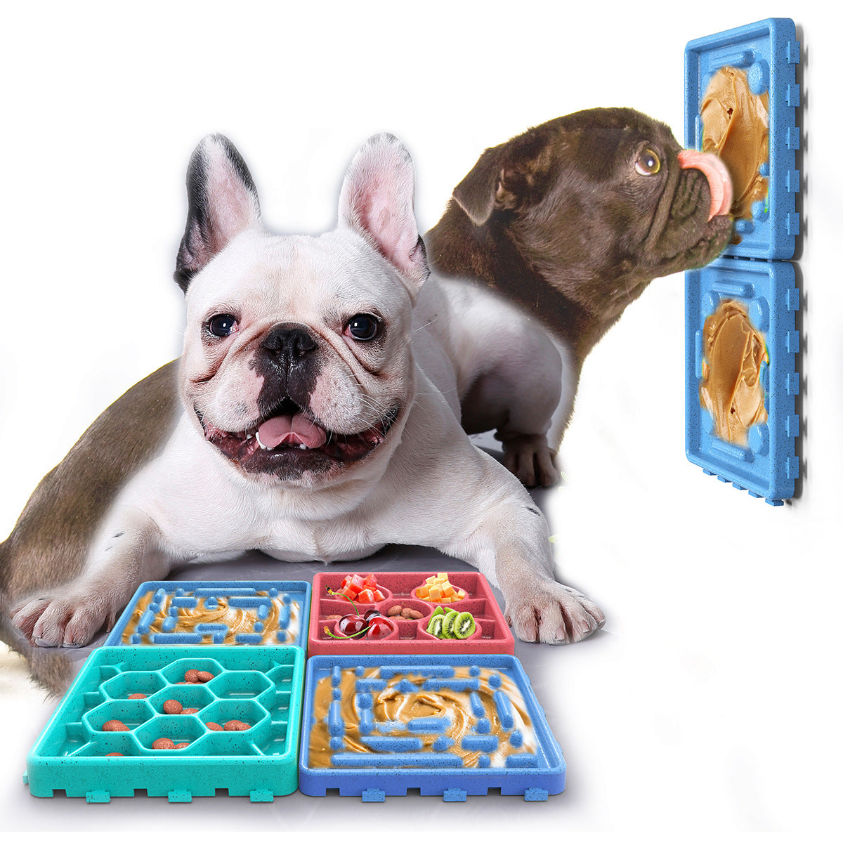 Slow feeder dog licking mat with multi-color panels beside a resting bulldog
