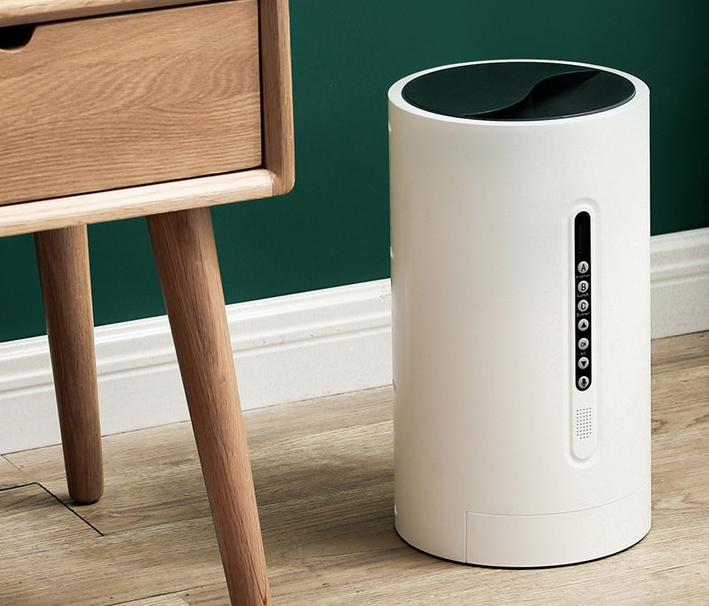 White smart pet feeder standing upright with side control panel and top reservoir
