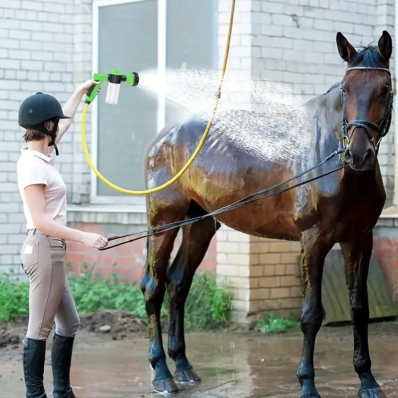 Dog shower sprayer attachment with green nozzle and spray stream for rinsing