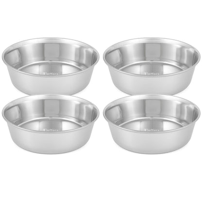 Two-by-two arrangement of stainless steel pet bowls, rounded polished interiors.