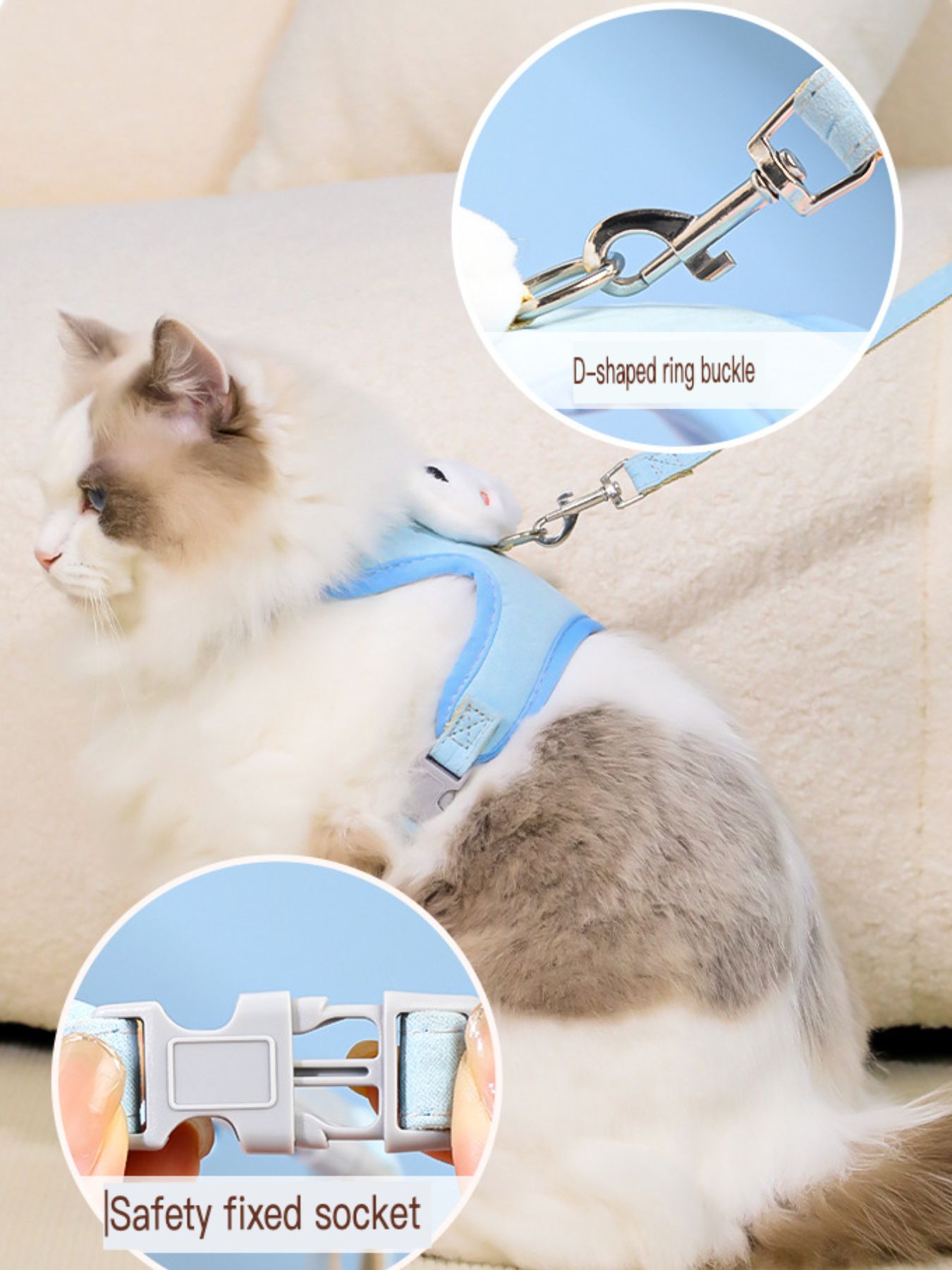 Blue pet harness with D-ring buckle and leash attachment, worn on a cat