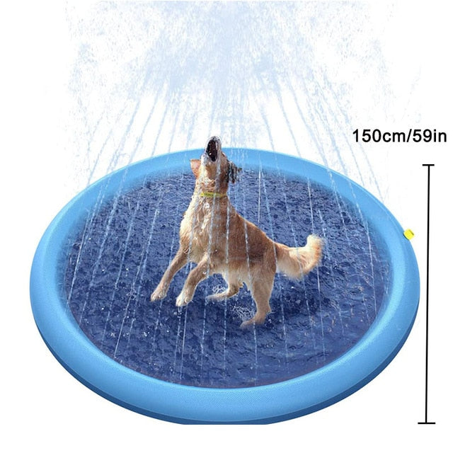 Blue round inflatable sprinkler cooling mat with water falling as a dog plays
