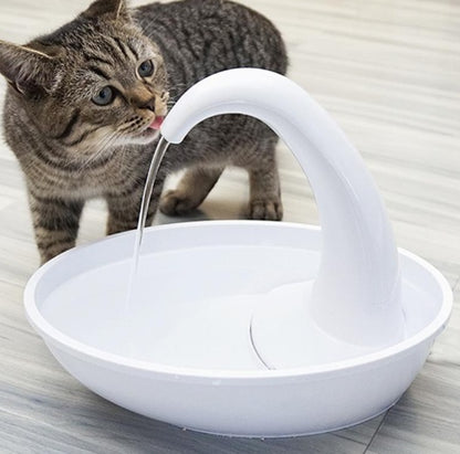 White automatic pet water dispenser bowl with curved drinking spout, cat drinking