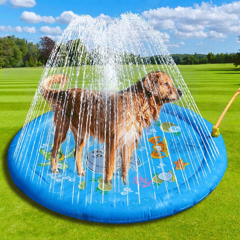 Blue round inflatable sprinkler cooling mat with water falling over a dog