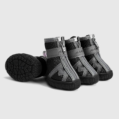 Waterproof pet rain boots, black with gray straps and textured tread outsole.