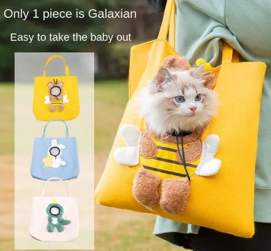 Cat in bee-themed carrier bag, perfect for pet travel and outdoor adventures.