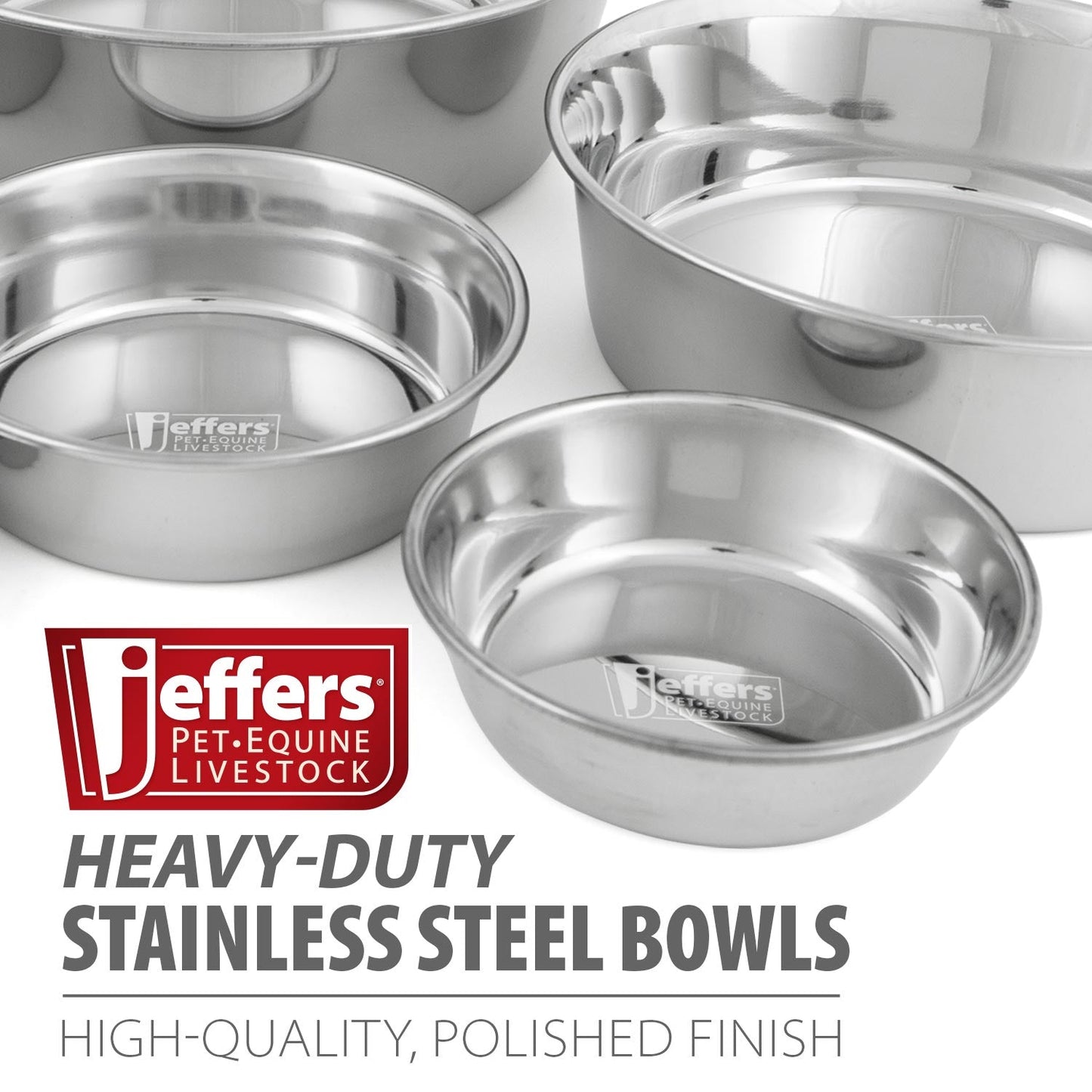 Stainless steel pet bowl set with several bowls visible, polished interiors and rims.