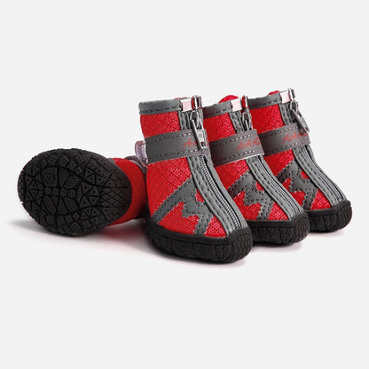 Waterproof pet rain boots, red with gray straps and non-slip tread sole.