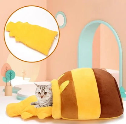 Adorable cat in cozy bee-shaped pet bed with soft yellow blanket, perfect for pampered pets