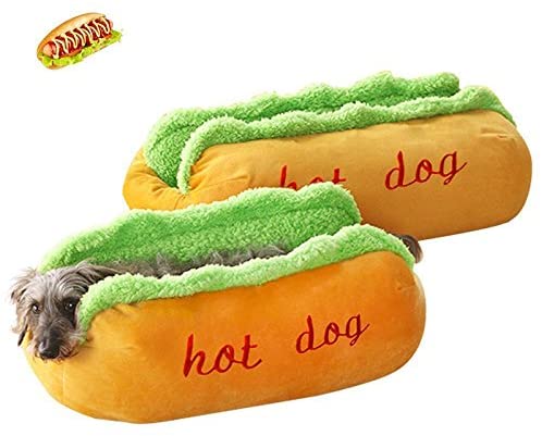 Hot dog-shaped pet bed with green top layer, orange body, and red 'hot dog' text.