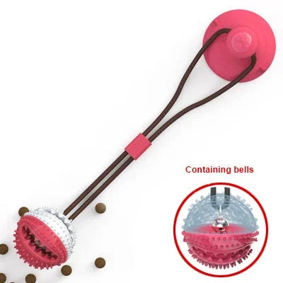 Pink dog chew toy with bells and treat-dispensing design for interactive play and mental stimulation