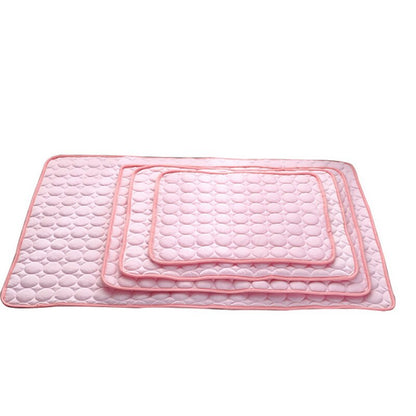 Pink pet cooling pad top view with bubble quilting and inner panel