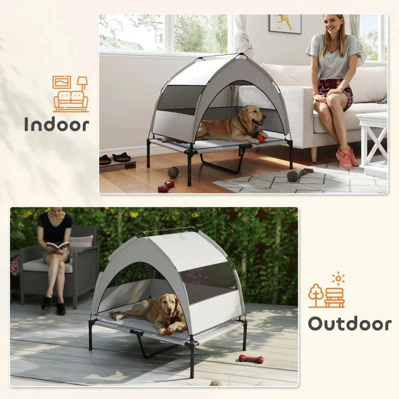 Light gray elevated dog bed with removable canopy on a raised cot base