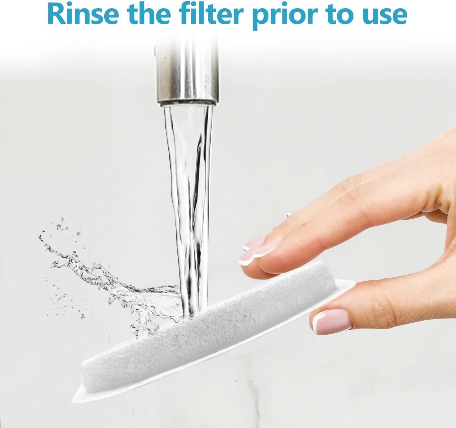 Cat water fountain filter replacement being rinsed by a hand before use