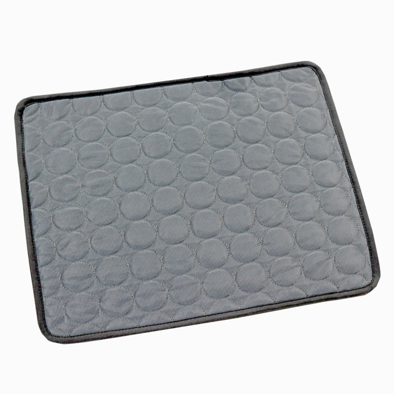 Gray cooling mat for dogs with raised bubble pattern and black border, rectangular