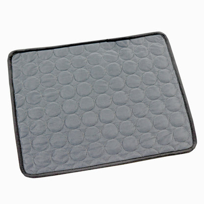 Gray cooling mat for dogs with raised bubble pattern and black border, rectangular