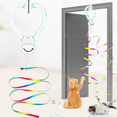 Heart-shaped cat door toy with multicolor ribbon rope and feather bird lure