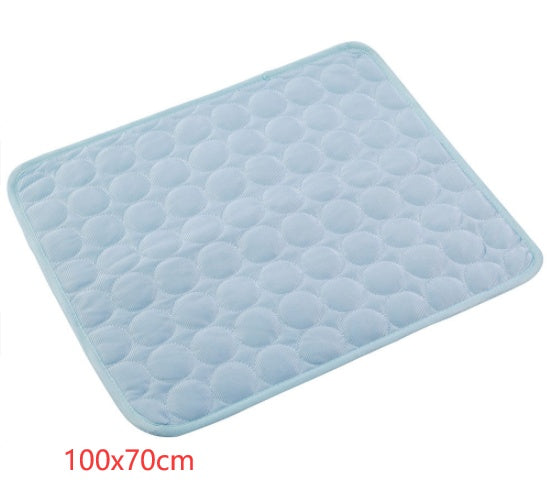Light blue pet cooling pad with raised bubble texture and padded edge