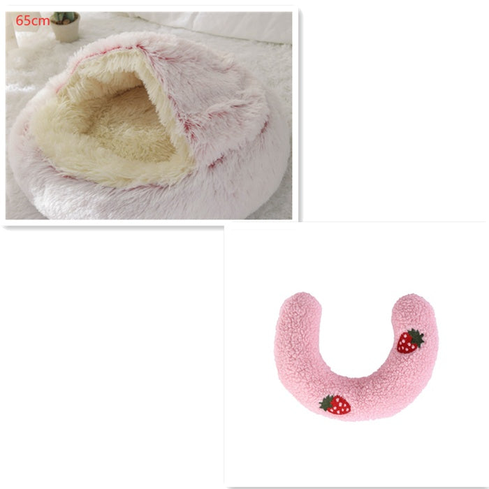Pink plush pet bed with U-shaped hood and beige interior