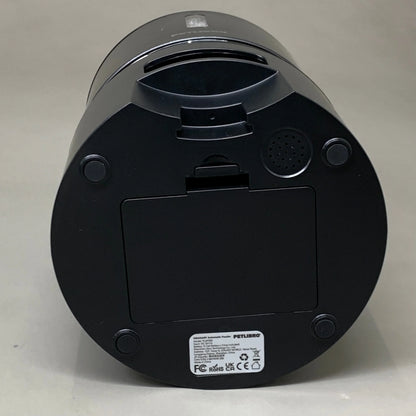 Black automatic cat feeder underside with vented speaker grille and access panel